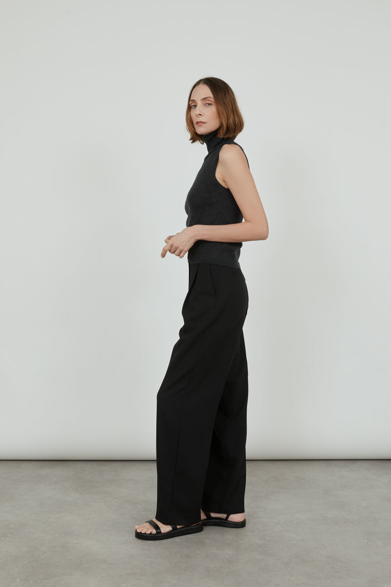 Deborah sleeveless top in the softest merino, cashmere and silk blend with black tailored trousers.