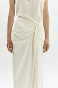Front view of Pamela cream cotton silk wrap skirt with low waist and draped silhouette