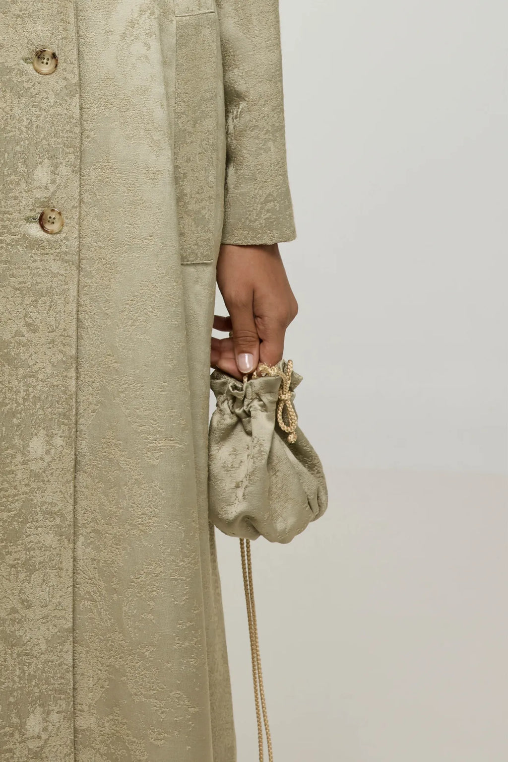 Bowie bag in gold viscose blend, front view.