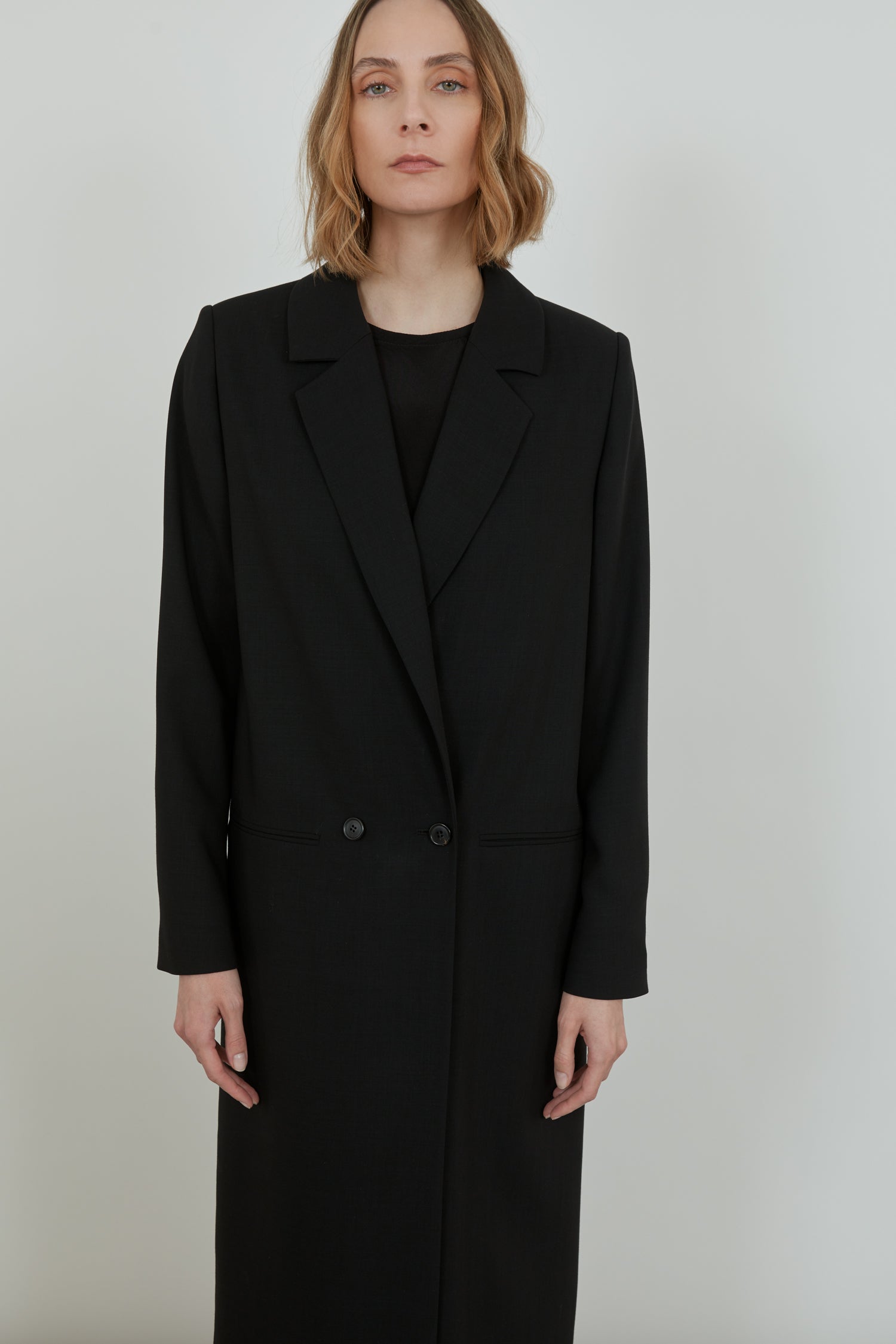 Black virgin wool Adeline coat in detail