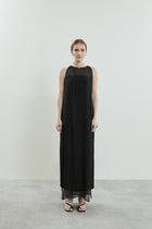 Front view of the black Danni dress in chiffon silk, open sides.