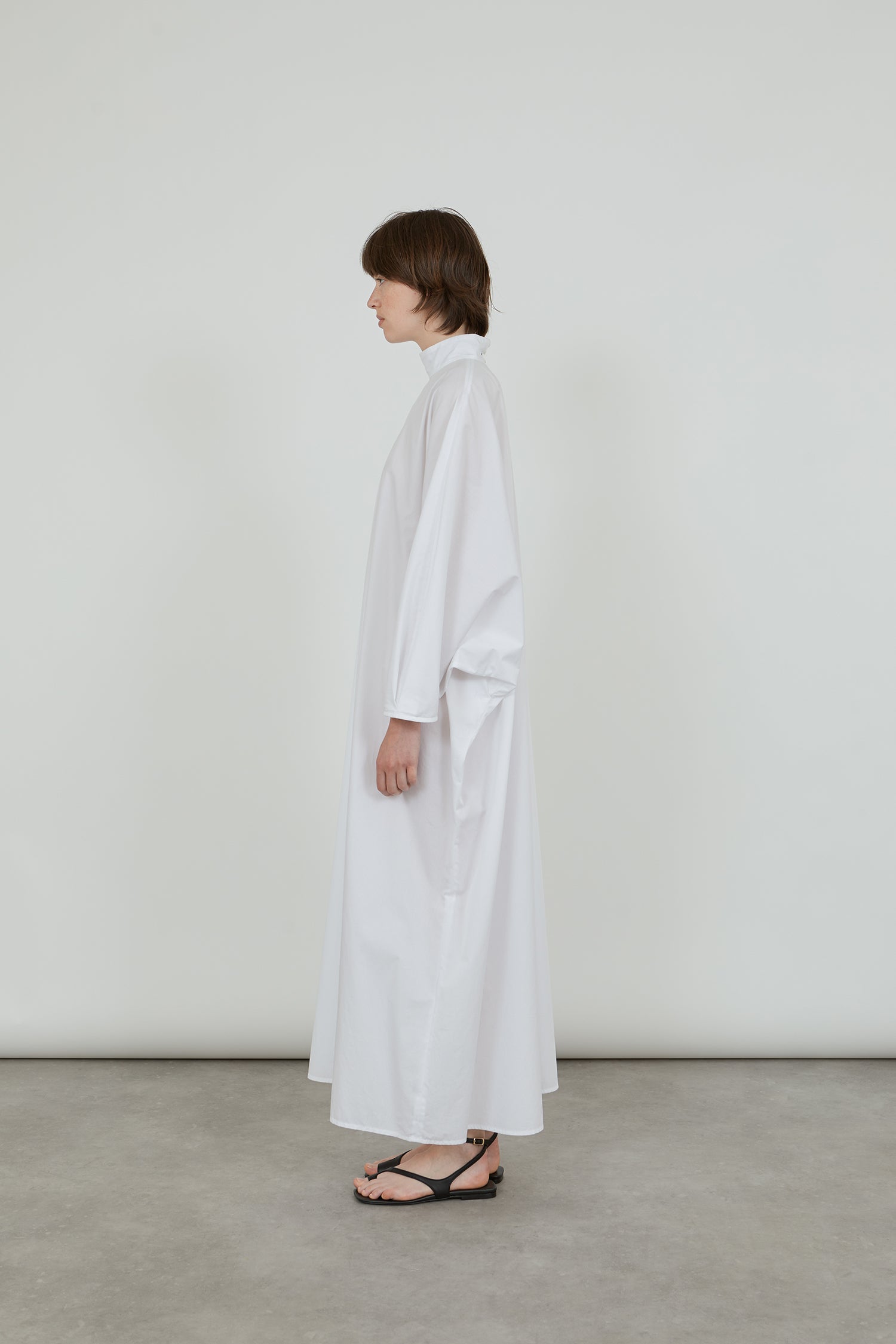 Side view of the white Emiko dress.