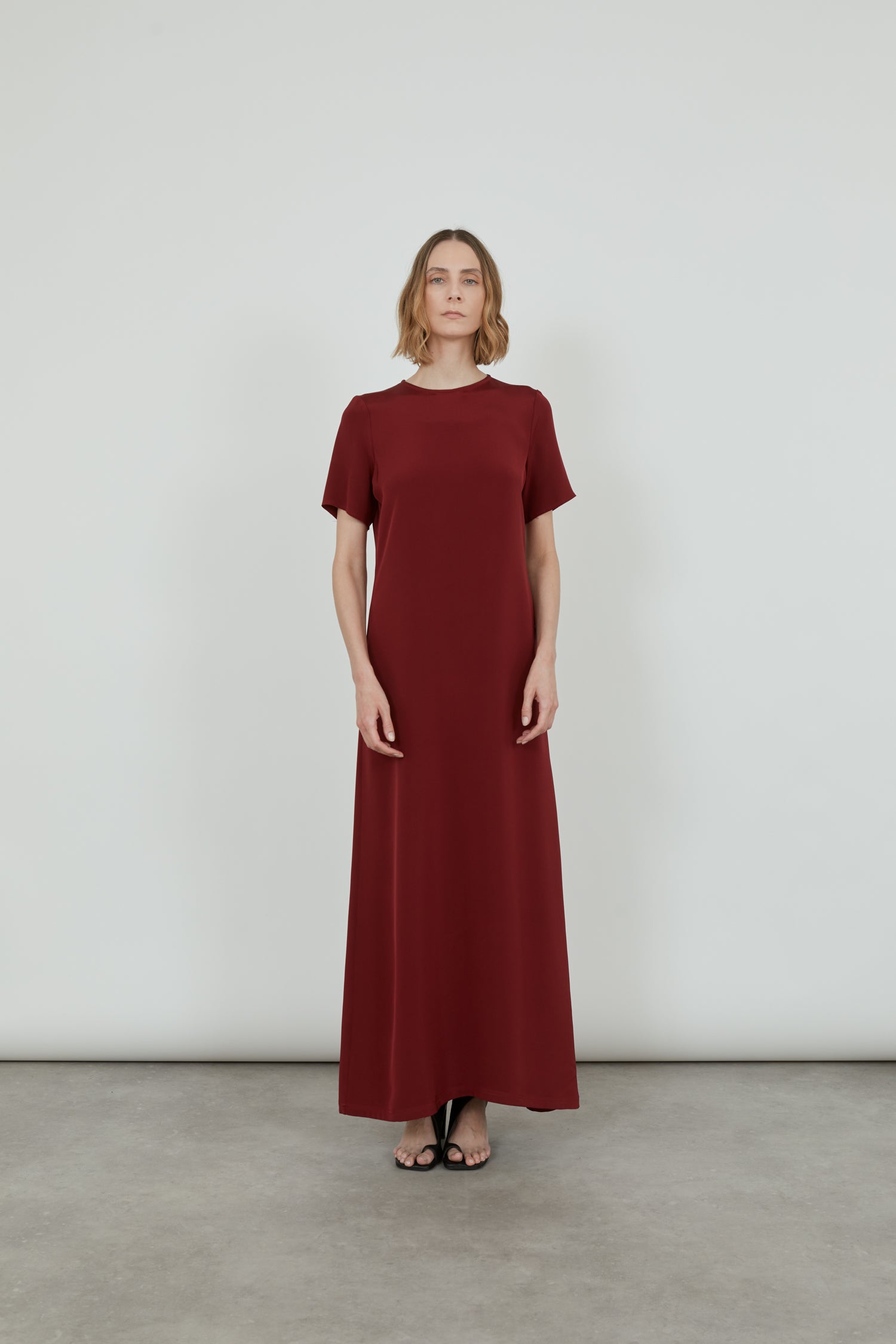 Front view of the red Celine ankle-length dress in luxurious crepe silk.