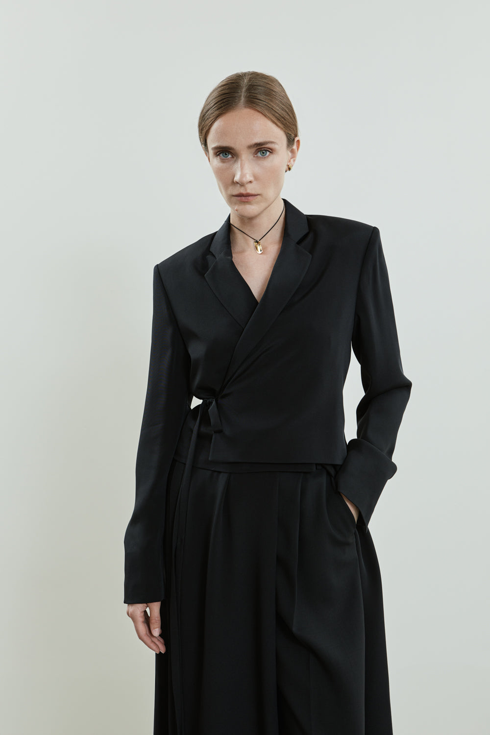 Close-up of the Lynn blazer in black crepe silk.