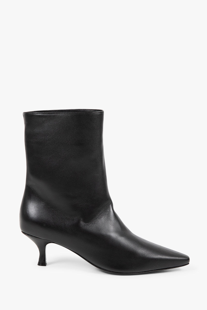 Front view of the Marge boots in black leather, featuring a sleek pull-on silhouette.