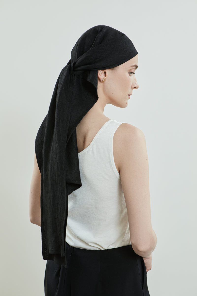 Close-up of the Roshan headscarf in black linen.