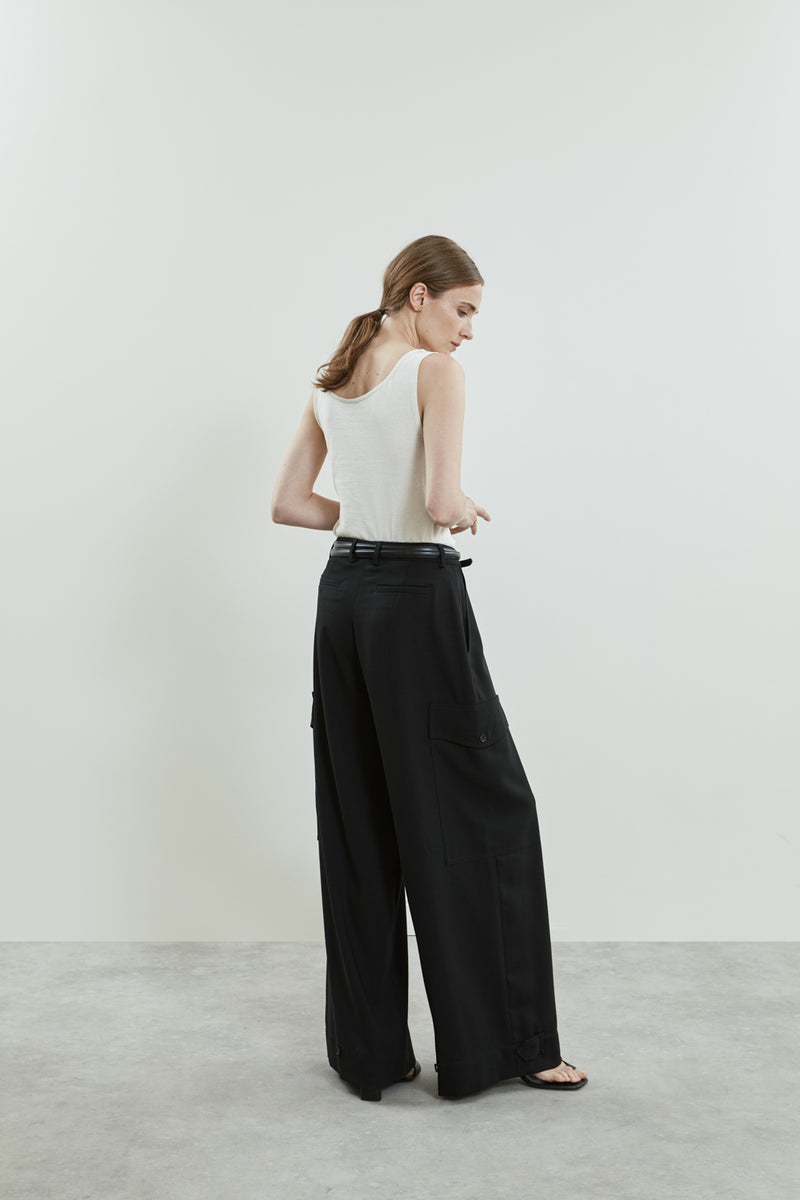 Full view of the Stein trousers in black virgin wool.