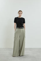 Front view of the Stein trousers in sage linen.