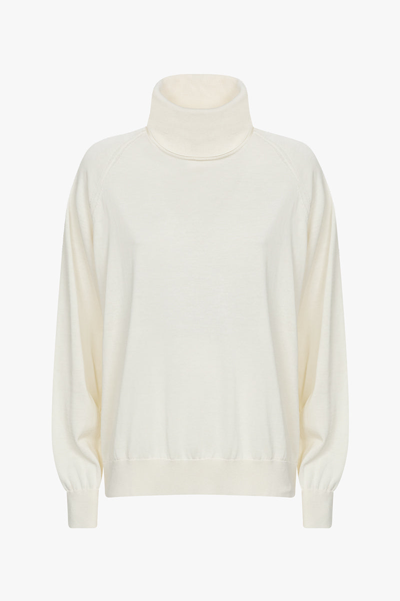Front view of the off-white Julien knitted turtleneck in soft cotton knit.